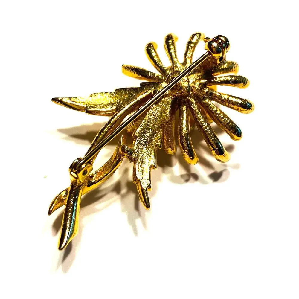 Dimensional goldtone flower power brooch with faux pearl bead center fashion pin